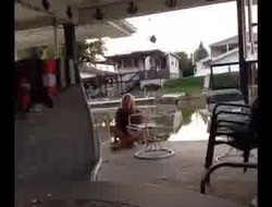 Girl pees in lake